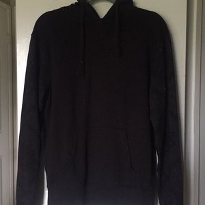 Black hoodie with pattern on the sleeves